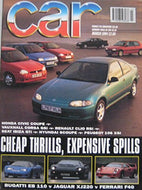 CAR magazine 03/1994 featuring Ferrari F40, Bugatti EB110, Jaguar XJ220, Renault Clio Williams, Vauxhall